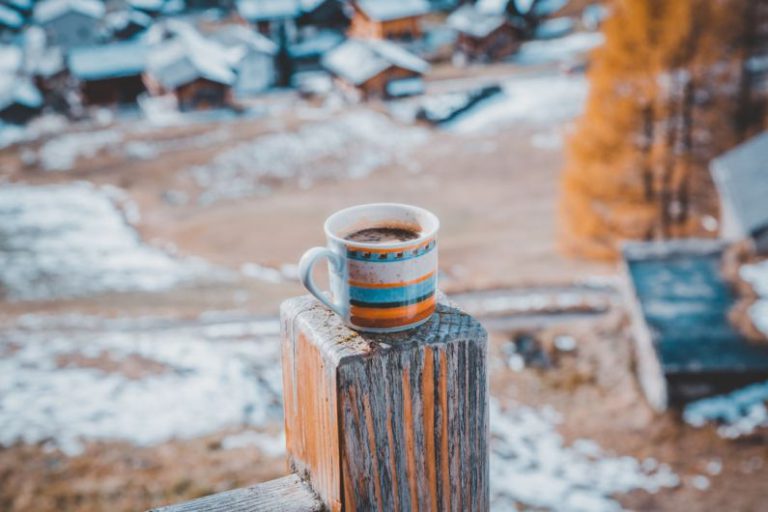 Wooden Tea Box - white, orange, and blue ceramic mug with brown liquid inside