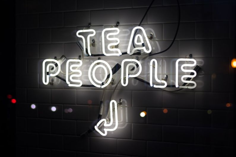 Yunnan Tea Can - tea people neon signage