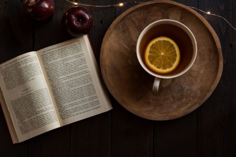 Ginger Tea Slice - top view of open book and cup with lemon inside