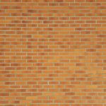 Carob Tea Brown - brown bricked wall