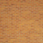 Carob Tea Brown - brown bricked wall