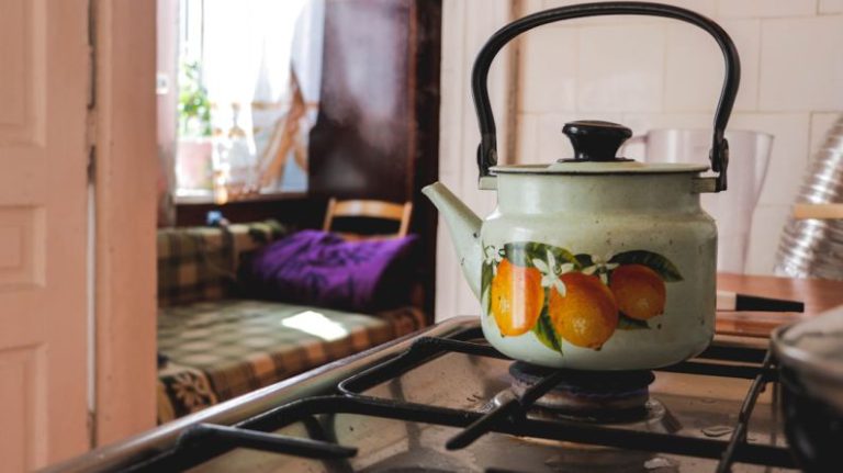 Kettle Boiling Water - kettle on gas stove