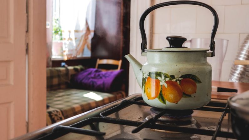 Kettle Boiling Water - kettle on gas stove