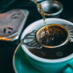 Green Tea Strainer - closeup photo of green ceramic cup with tea