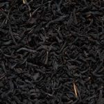 Black Tea Cup - black burnt matchsticks closeup photography