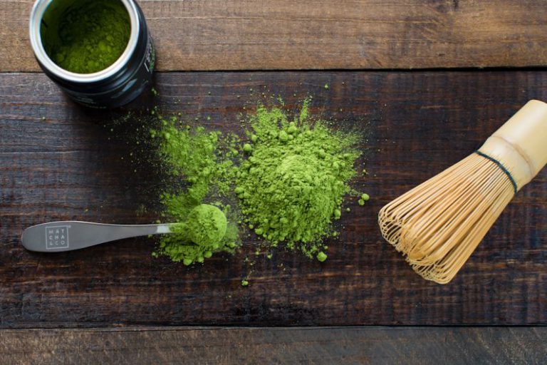 Matcha Tea Chasen - green powder and spoon on board