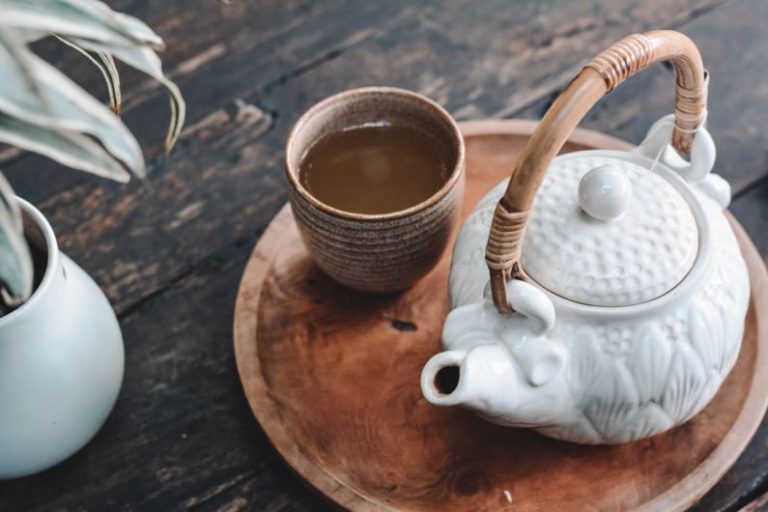 Long Jing Tea Tray - white and brown ceramic teapot on wooden tray