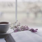 Matcha Tea Ceremony - white ceramic teacup on white ceramic saucer on table