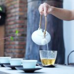 Sencha Tea Brew - person holding kettle