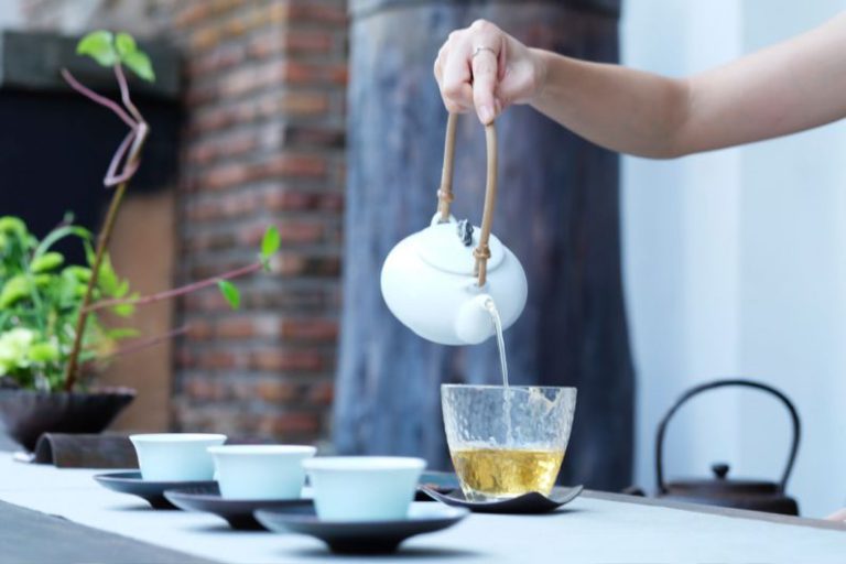 Sencha Tea Brew - person holding kettle