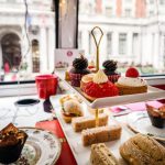 British High Tea - strawberry cake on white ceramic plate