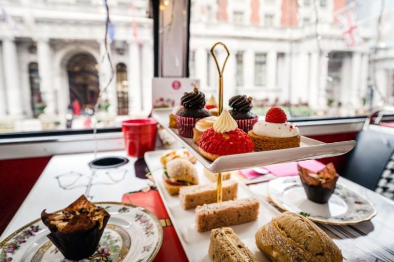 British High Tea - strawberry cake on white ceramic plate