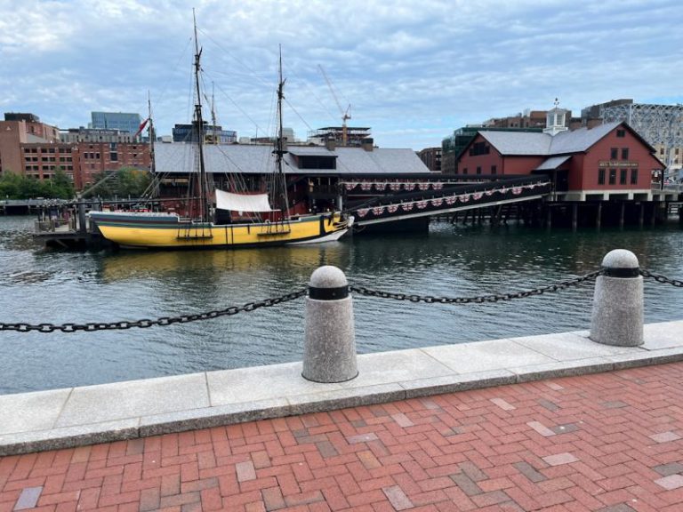 Boston Tea Party - a boat docked at a pier