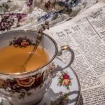 Victorian Tea Party - a cup of tea sitting on top of a saucer