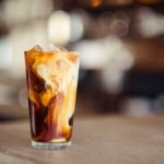 Irish Tea Cup - glass cup filled with ice latte on tabletop